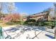 View of the community sport court for outdoor recreation, surrounded by mature trees at 765 Houston Mill Ne Rd # 7, Atlanta, GA 30329