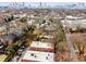 An aerial view of property showcasing a cityscape and many trees, buildings and streets in the neighborhood at 1111 Briarcliff Ne Pl # 2, Atlanta, GA 30306