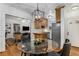 Eat-in kitchen/dining area with hardwood floors, pendant lighting, and stainless steel appliances at 1111 Briarcliff Ne Pl # 2, Atlanta, GA 30306