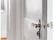 Close up of an ornate crystal door knob on a white painted door at 1111 Briarcliff Ne Pl # 2, Atlanta, GA 30306
