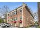 Exterior view of a multi-story brick apartment building at 1111 Briarcliff Ne Pl # 2, Atlanta, GA 30306