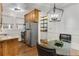 Eat-in kitchen featuring wood cabinets, granite counters, and stainless steel appliances at 1111 Briarcliff Ne Pl # 2, Atlanta, GA 30306