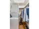 Stacked washer and dryer with extra hanging space and cleaning supplies in closet at 1111 Briarcliff Ne Pl # 2, Atlanta, GA 30306