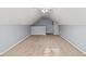 Spacious bonus room with neutral carpeting, ideal for a playroom, office, or entertainment area at 395 Shadetree Ln, Lawrenceville, GA 30044