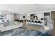 Spacious common area with modern kitchen, cozy fireplace, and recreational amenities for residents at 775 Juniper Ne St # 111, Atlanta, GA 30308
