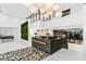 Bright lobby featuring stylish lighting, front desk, and plant wall at 775 Juniper Ne St # 111, Atlanta, GA 30308