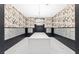 Mailroom with bird-themed wallpaper, marble floors and contemporary light fixtures at 775 Juniper Ne St # 111, Atlanta, GA 30308