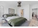 Stylish main bedroom features a comfortable bed, modern furnishings, and access to a closet at 775 Juniper Ne St # 111, Atlanta, GA 30308