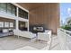 Relaxing outdoor patio featuring a fireplace, comfortable seating, and scenic city views at 775 Juniper Ne St # 111, Atlanta, GA 30308