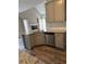 Kitchen area featuring stainless steel appliances, ample counter space, and modern finishes at 1099 Wynford Cmns, Marietta, GA 30064