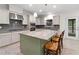 Beautiful kitchen with a large island, stainless steel appliances, and plenty of cabinet space at 1439 Mill Pointe Ct, Lawrenceville, GA 30043