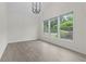 Bright and airy living room featuring large windows with natural light at 1439 Mill Pointe Ct, Lawrenceville, GA 30043