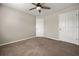 Bedroom featuring neutral walls, carpet and a closet with a door at 1851 Millwood Park Ct, Buford, GA 30518
