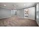 Spacious carpeted bedroom with natural light and en suite bathroom at 1851 Millwood Park Ct, Buford, GA 30518
