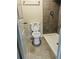 Bathroom featuring tiled shower stall and neutral flooring at 2958 Parc Lorraine, Lithonia, GA 30038