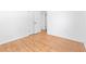 Bedroom featuring hardwood floors and closet at 5726 Southwick Sw Ct, College Park, GA 30349