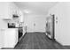 Modern kitchen with stainless steel appliances and white cabinets at 5726 Southwick Sw Ct, College Park, GA 30349