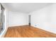 Spacious living room with hardwood floors, white walls, and natural light at 5726 Southwick Sw Ct, College Park, GA 30349