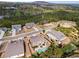 Aerial view featuring several homes, lush trees, and a beautiful landscape in the neighborhood at 108 Summer Breeze Ln, Canton, GA 30114