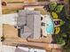 Aerial view of a home with manicured lawn, private pool, and entertainment patio at 108 Summer Breeze Ln, Canton, GA 30114