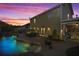 Exterior view of home with backyard pool at sunset at 108 Summer Breeze Ln, Canton, GA 30114