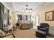 Large main bedroom with tray ceiling features sitting area and neutral carpet at 108 Summer Breeze Ln, Canton, GA 30114