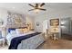 Serene primary bedroom with a comfortable bed, neutral tones, and a cozy sitting area at 108 Summer Breeze Ln, Canton, GA 30114