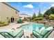 Inviting backyard pool with comfortable lounge chairs and stone accents at 108 Summer Breeze Ln, Canton, GA 30114