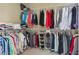 Spacious walk-in closet providing ample storage for clothes, shoes and accessories at 108 Summer Breeze Ln, Canton, GA 30114