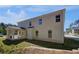 Spacious backyard showcasing a covered patio and expansive yard, perfect for outdoor entertaining at 141 Frontier Way, Mcdonough, GA 30253