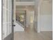 Bright foyer featuring hardwood floors, white wainscoting and a staircase with iron spindles at 141 Frontier Way, Mcdonough, GA 30253
