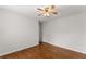 Bedroom showcasing hardwood floors, a ceiling fan, and a closet at 1925 Emerald Dr, Cumming, GA 30040