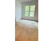 Bedroom with large windows providing natural light, awaiting your personal touch at 207 Tiburon Dr, Stonecrest, GA 30038