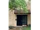 Inviting front entrance features a black door with clear house number above at 207 Tiburon Dr, Stonecrest, GA 30038