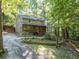Inviting home with a covered front porch and nicely landscaped yard at 613 Rock Springs Pass, Dallas, GA 30157