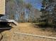 Expansive, overgrown, and fenced in back yard at 1125 Durrell St, Austell, GA 30106