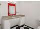 Classic bathroom with granite countertop and checkerboard flooring at 1175 Kingsley Ne Cir, Atlanta, GA 30324