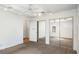 Spacious bedroom featuring mirrored closet and light from the exterior window at 1175 Kingsley Ne Cir, Atlanta, GA 30324