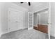 Bedroom featuring neutral colors and a doorway view into an adjacent room at 1158 Welch Sw St, Atlanta, GA 30310