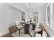 Dining area featuring a contemporary table and chairs set on a decorative rug at 1158 Welch Sw St, Atlanta, GA 30310