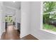 Hallway area with hardwood floors and neutral paint, leading to kitchen and living areas at 1158 Welch Sw St, Atlanta, GA 30310