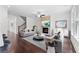 Brightly staged living room features hardwood floors, fireplace, and stylish furnishings at 1158 Welch Sw St, Atlanta, GA 30310