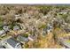 A neighborhood with mix of houses, mature trees, and cityscape backdrop at 333 Drexel Ave, Decatur, GA 30030