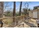 Back deck with outdoor seating that overlooks the yard and trees and offers a relaxing outdoor space at 333 Drexel Ave, Decatur, GA 30030