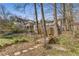 Backyard with wooden decks and a stone pathway, complemented by a view of the home and the surrounding yard at 333 Drexel Ave, Decatur, GA 30030