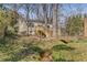 Quaint home with a creek, wooden bridge, back deck, and natural setting at 333 Drexel Ave, Decatur, GA 30030