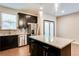 Kitchen featuring granite counters, stainless steel appliances and island with pendant lights at 992 Belfry Ter, Fairburn, GA 30213
