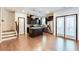 Modern kitchen with an island, stainless steel appliances, and dark cabinets at 992 Belfry Ter, Fairburn, GA 30213