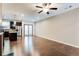 Bright living space featuring hardwood floors, recessed lighting, and an open layout to the kitchen at 992 Belfry Ter, Fairburn, GA 30213