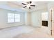 Bright bedroom with carpet floors, ensuite bathroom and large window at 992 Belfry Ter, Fairburn, GA 30213